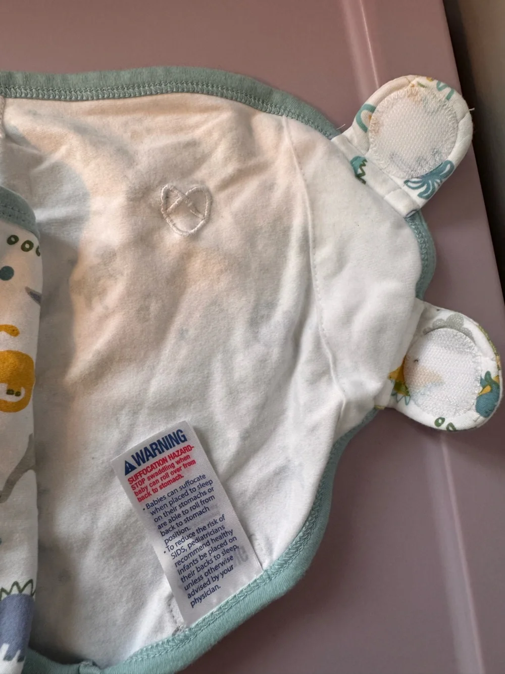 SwaddleMe White Bib with Green, Blue and Yellow Dinosaur Print 0-3 months‎
